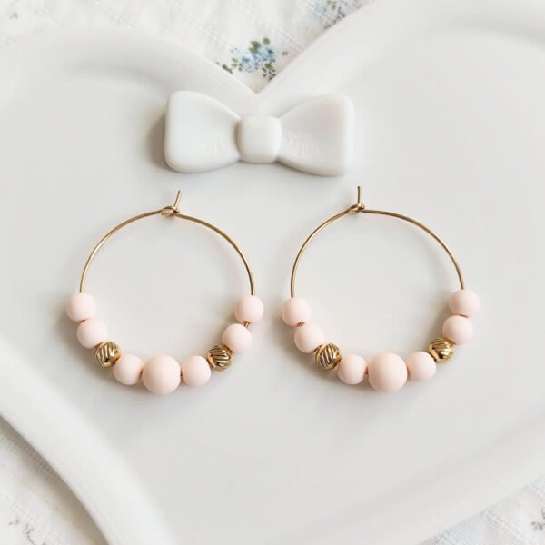 boucles d'oreilles créoles rose pastel