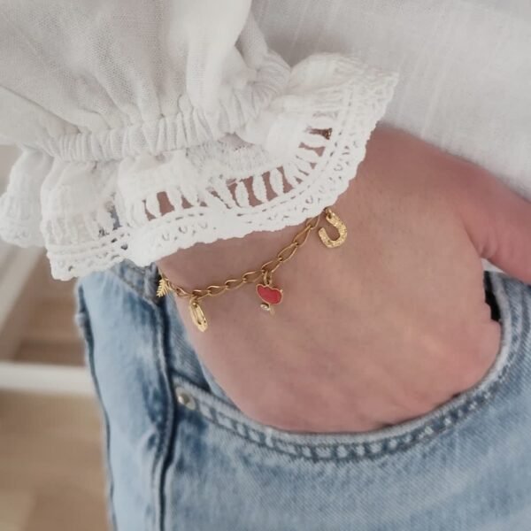 bracelet-breloques-inox-dore-fleur Bracelet à breloques - Camille